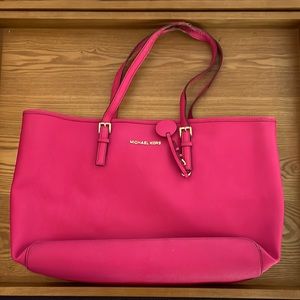 Pink Jetset Michael Kors laptop tote bag.